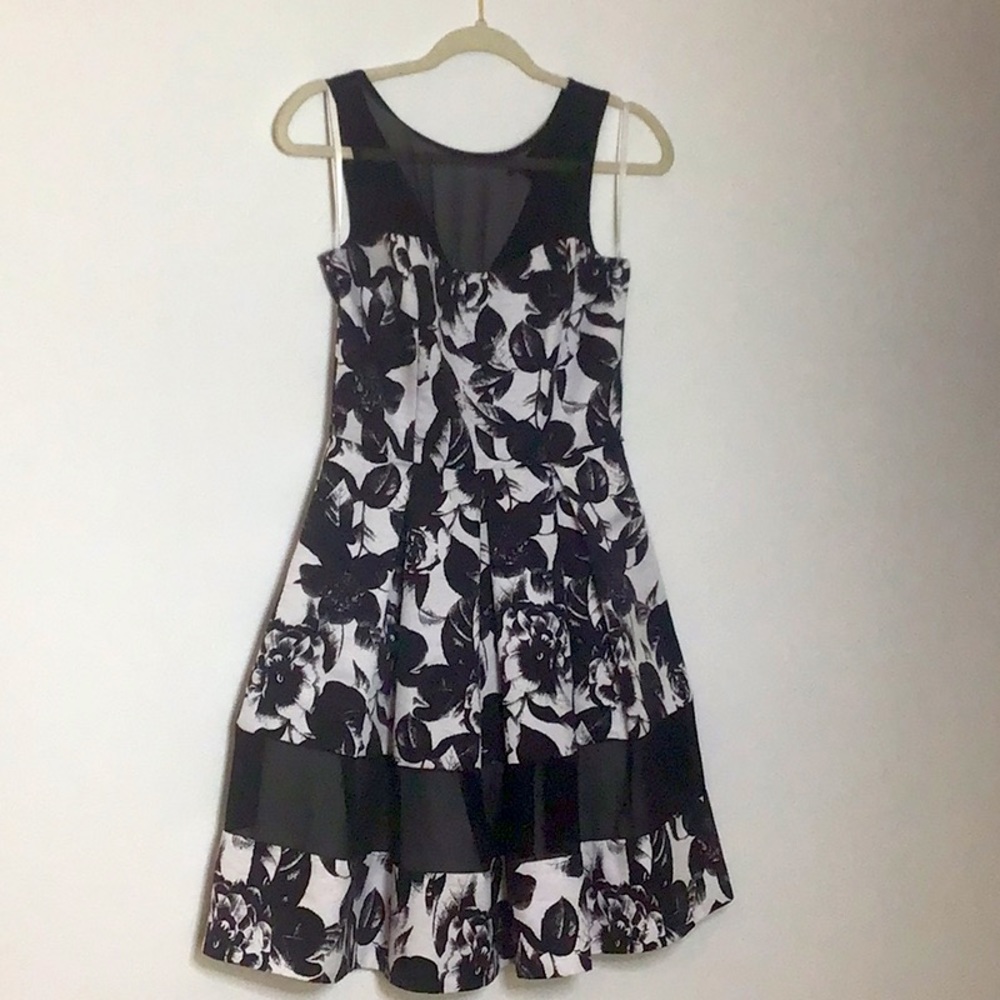 White House Black Market Size 2. Beautiful fit. Worn one time.  Black and white